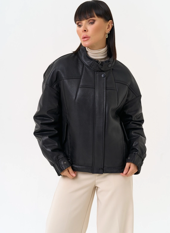 Женский пуховик из натуральной кожи черного цвета фото