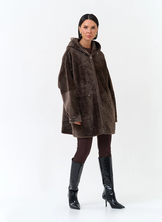 Женская двухсторонняя дубленка из натурального меха с капюшоном фото